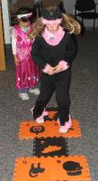 abbott 2006 kid halloween party - kids doing hopscotch 